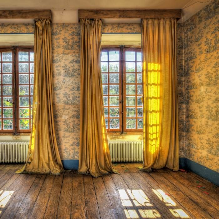 dark walnut wood curtain rod with laser‑etched pattern, living‑room, sophisticated rustic look