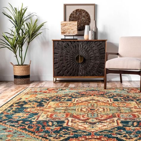 Natural seagrass rug, woven wave pattern, light sand tones, breezy beach‑style living‑room