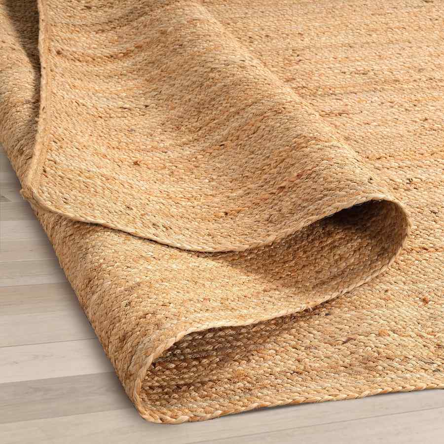 Silk‑velvet area rug, plush pile, muted gold pattern, formal living room
