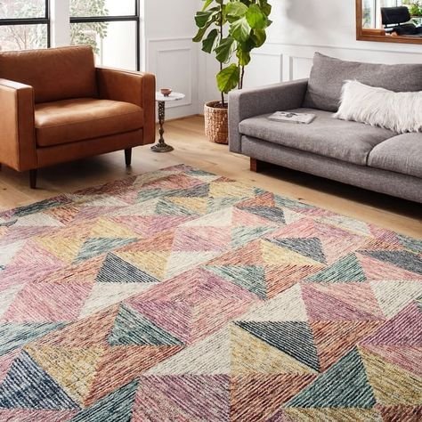 Concrete‑look rug, low‑pile nylon, gray tones, loft‑style living area