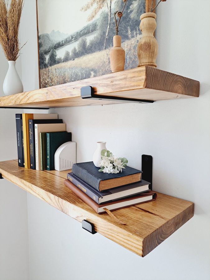 Floating shelf with glass top and wood base, sleek finish, hidden mounting, modern living‑room accent
